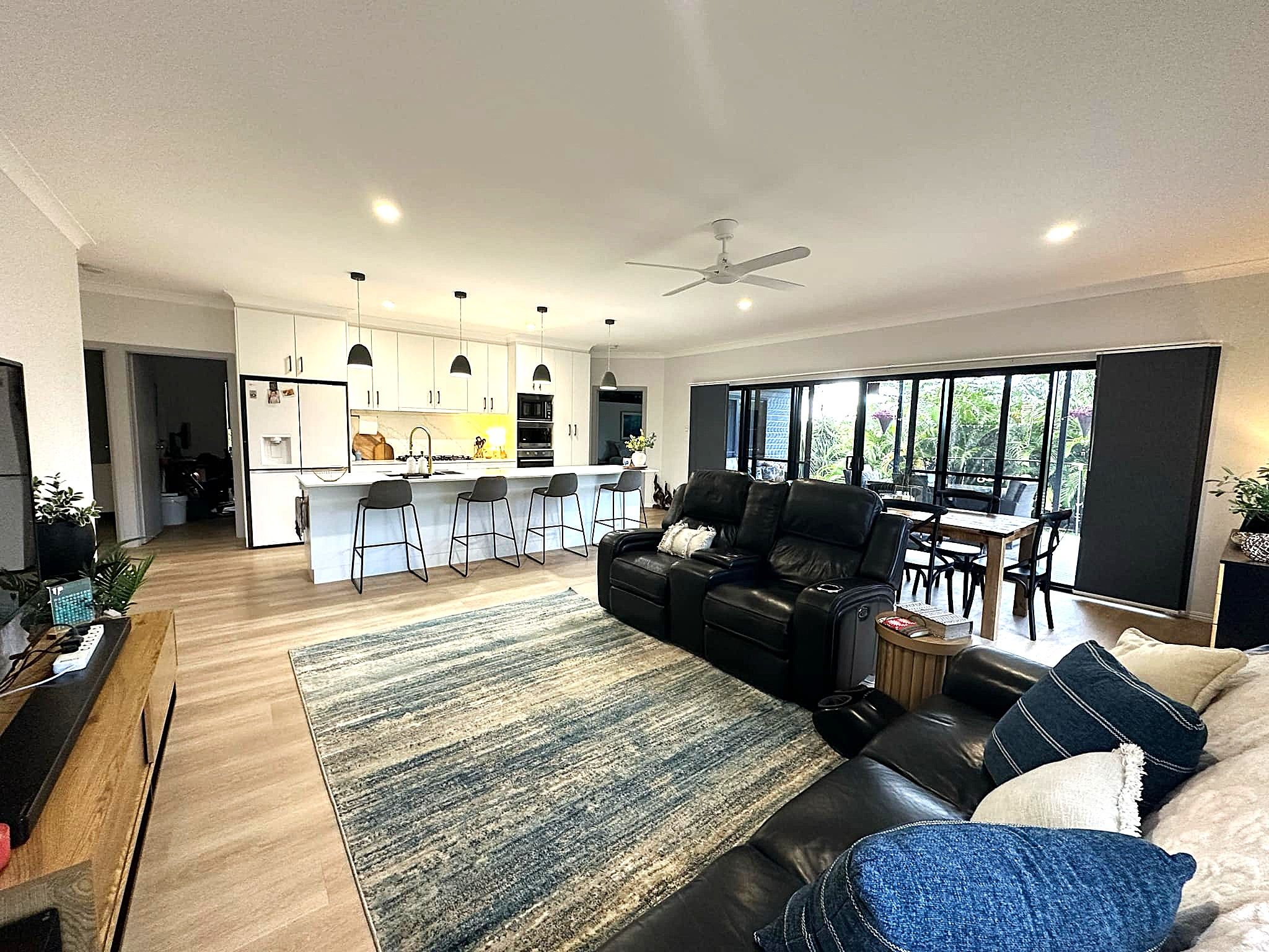 Landscaped tropical gardens and a stunning family home